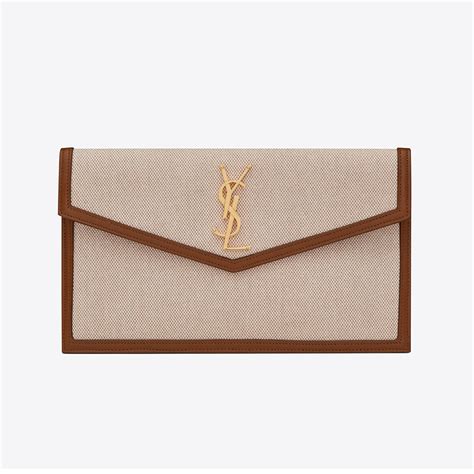 ysl uptown clutch selfridges|UPTOWN pouch in canvas and smooth leather .